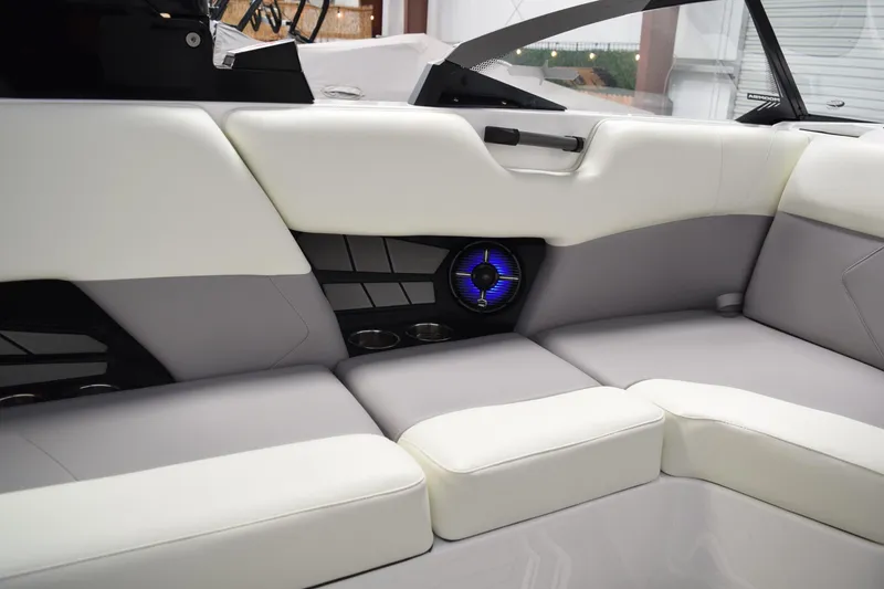 Slide: The Image of Luxurious interior of 2026 Moomba Tykon boat with modern seating and speaker system. - 15