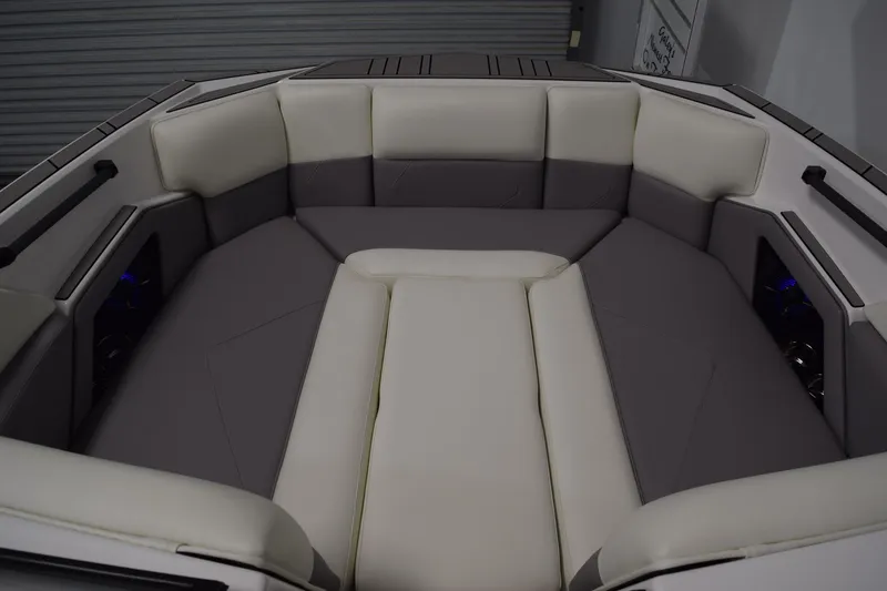 Slide: The Image of 2026 Moomba Tykon boat interior with cushioned seating in a modern design. - 21