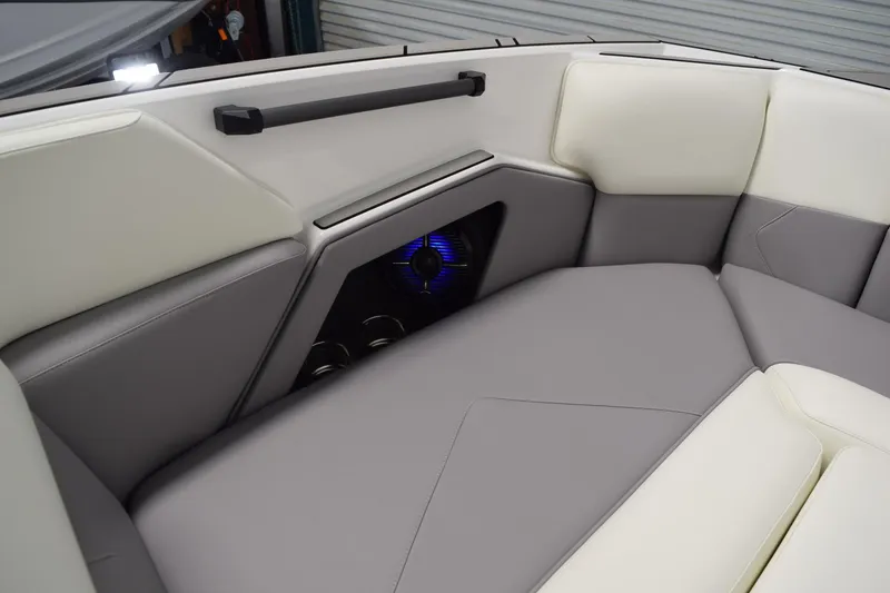 Slide: The Image of Interior of 2026 Moomba Tykon boat with sleek seating and modern speaker system. - 22