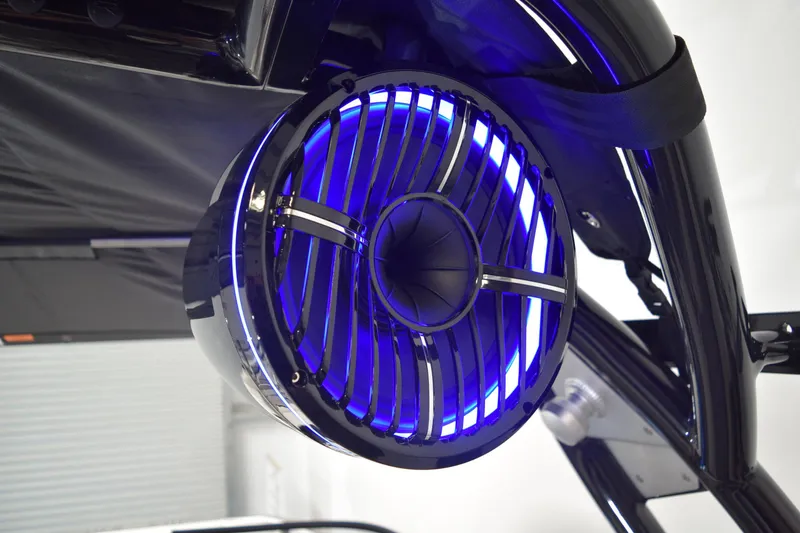 Slide: The Image of Close-up of a 2026 Moomba Tykon boat speaker with blue LED lighting. - 26