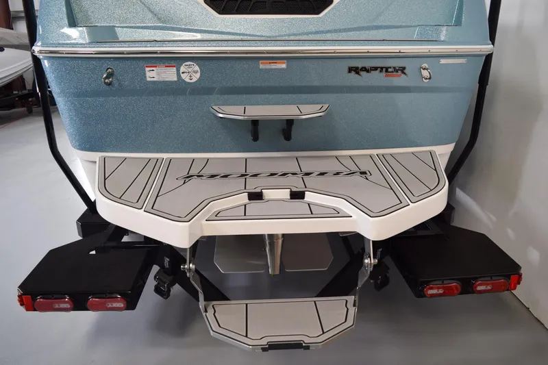 Slide: The Image of 2026 Moomba Tykon boat rear view with Raptor engine and swim platform. - 8