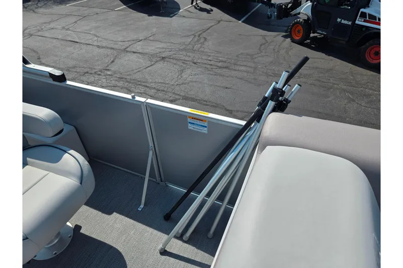 Slide: The Image of 2025 Godfrey Sweetwater 2286 QS pontoon boat interior with seating and railing details. - 14