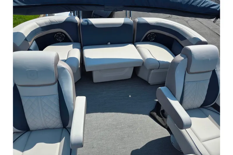 Slide: The Image of Luxurious interior of 2025 Godfrey Sweetwater 2286 QS pontoon boat with plush seating. - 17