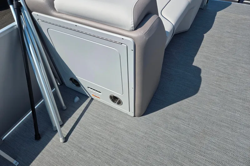 Slide: The Image of 2025 Godfrey Sweetwater 2286 QS boat interior with seating and storage compartment. - 23