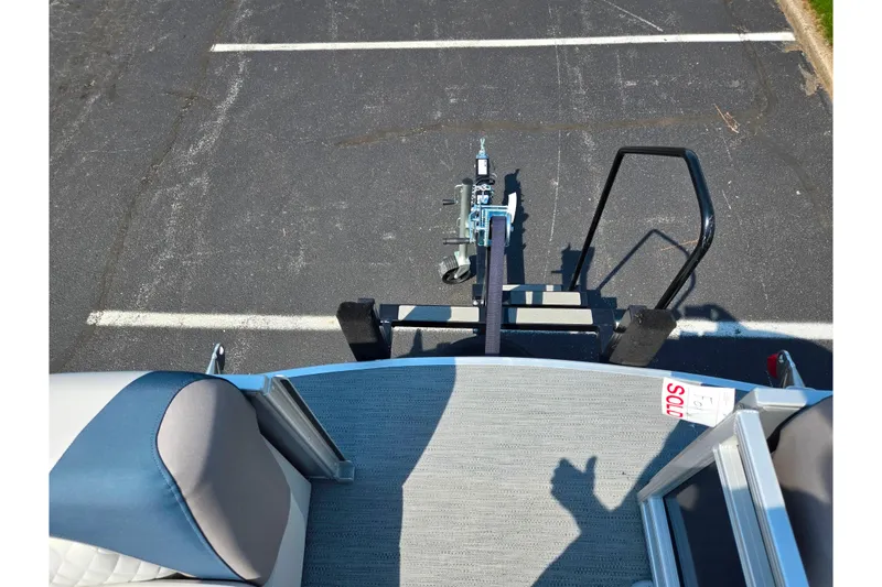 Slide: The Image of 2025 Godfrey Sweetwater 2286 QS boat trailer hitch in parking lot. - 26