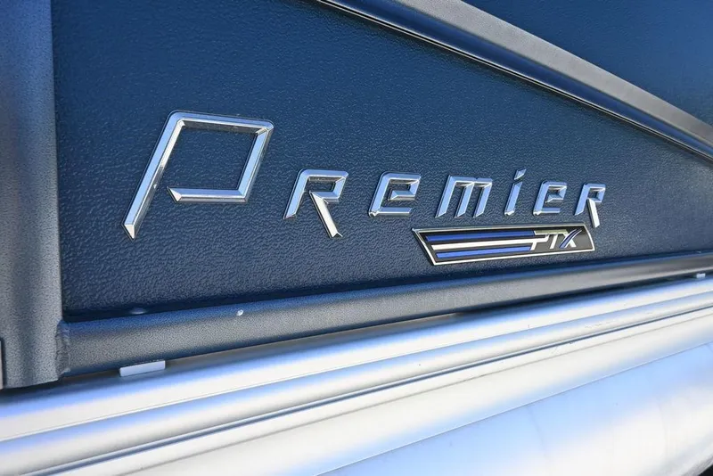 Slide: The Image of Premier 230 Sunsation RL - CL 2020 logo on sleek black surface. - 2