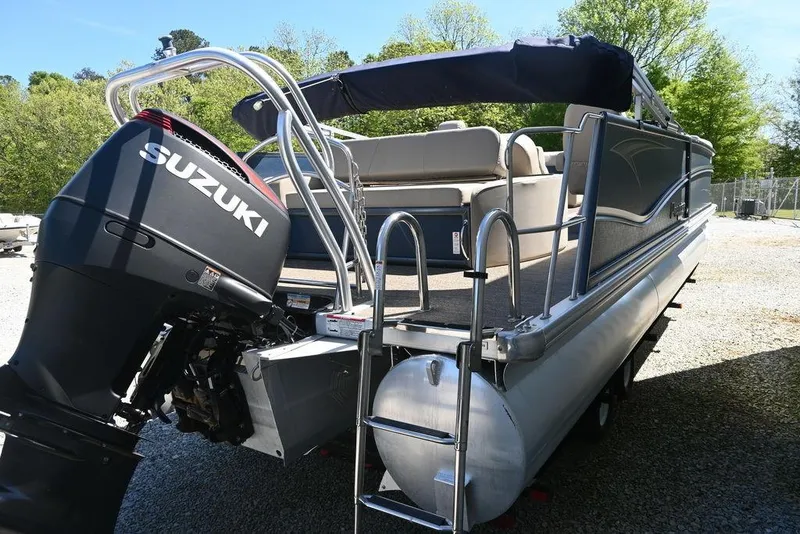 Slide: The Image of 2020 Premier 230 Sunsation RL - CL pontoon boat with Suzuki outboard motor. - 4