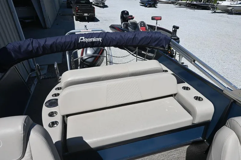 Slide: The Image of 2020 Premier 230 Sunsation RL-CL boat interior with seating and cup holders. - 6