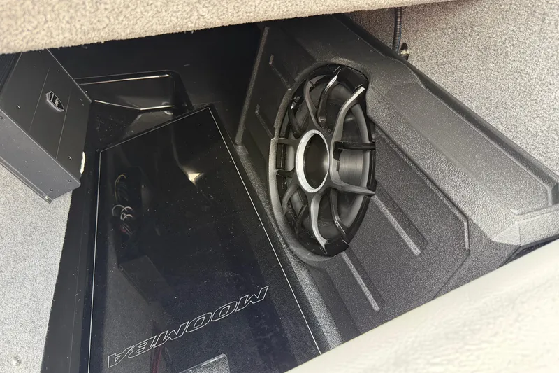 Slide: The Image of 2026 Moomba Tykon interior audio system with subwoofer and amplifier. - 18