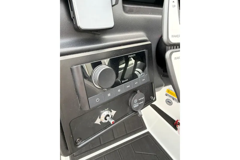 Slide: The Image of 2026 Moomba Tykon dashboard featuring Fusion audio controls and wakeboard settings. - 19