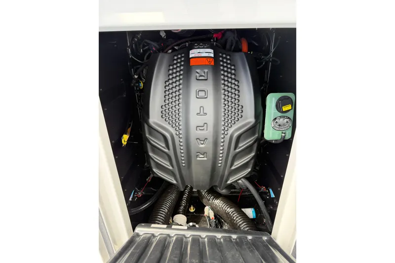 Slide: The Image of 2026 Moomba Tykon engine compartment featuring a Raptor engine cover. - 24