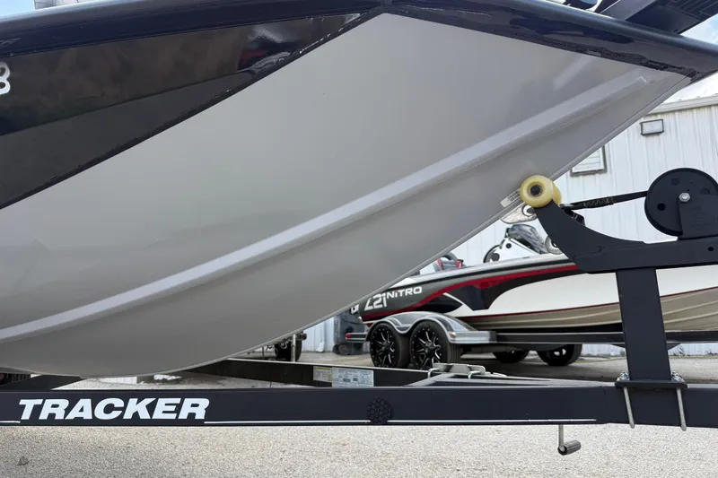 Slide: The Image of 2020 Tracker Pro Team 190 TX boat on trailer, close-up view. - 10