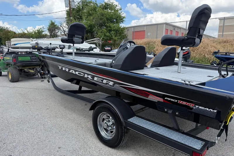 Slide: The Image of 2020 Tracker Pro Team 190 TX boat on trailer, parked outdoors. - 15