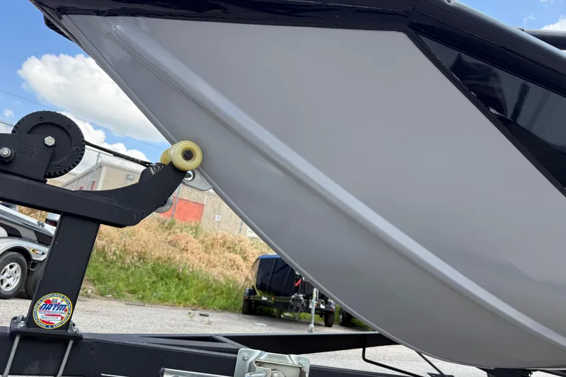 Slide: The Image of 2020 Tracker Pro Team 190 TX boat on trailer, close-up view of hull and winch. - 18