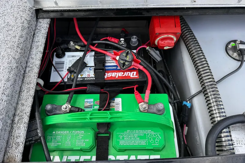Slide: The Image of Battery compartment of 2020 Tracker Pro Team 190 TX boat with wiring and connections. - 22
