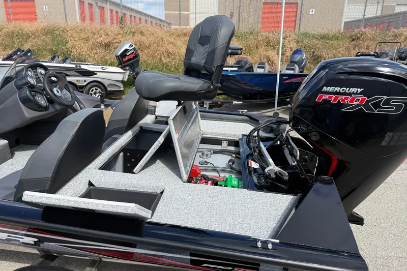 Slide: The Image of 2020 Tracker Pro Team 190 TX boat with Mercury Pro XS engine, open storage compartments. - 27