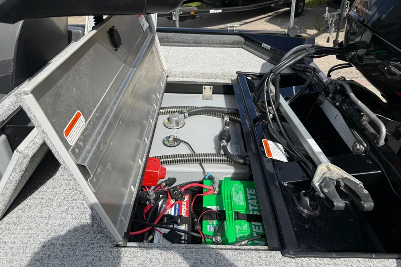 Slide: The Image of 2020 Tracker Pro Team 190 TX boat battery compartment with wiring and components. - 35