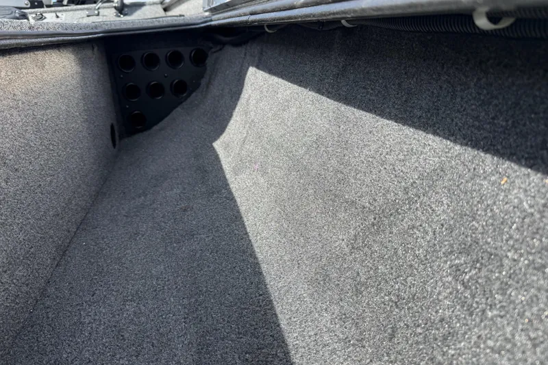 Slide: The Image of Interior view of 2020 Tracker Pro Team 190 TX boat storage compartment. - 40