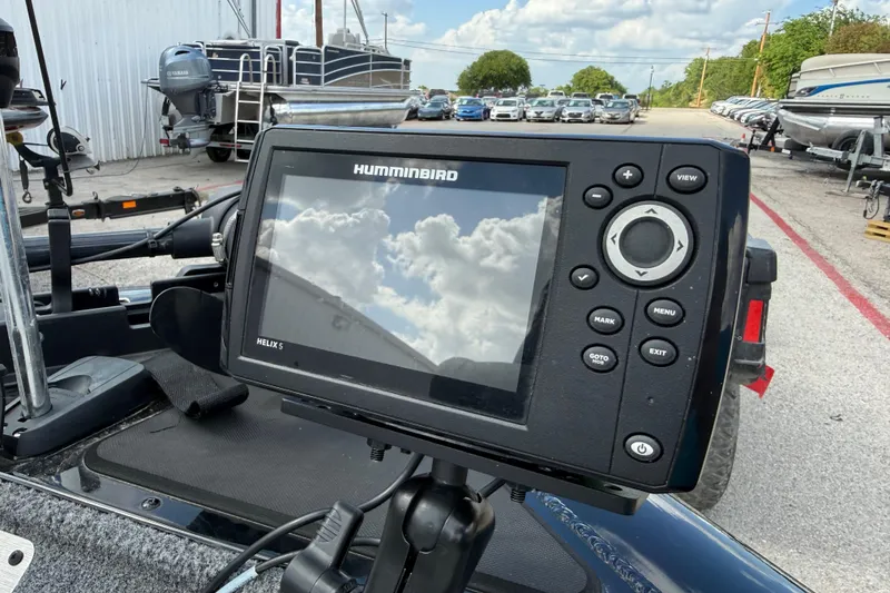 Slide: The Image of Fishfinder on a 2020 Tracker Pro Team 190 TX boat, reflecting cloudy sky. - 41