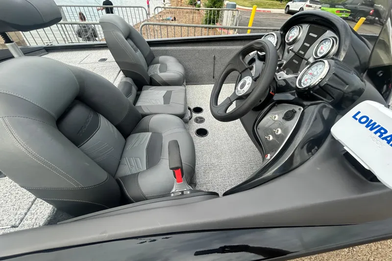 Slide: The Image of 2020 Tracker Pro Team 190 TX boat interior with steering wheel and gauges. - 55
