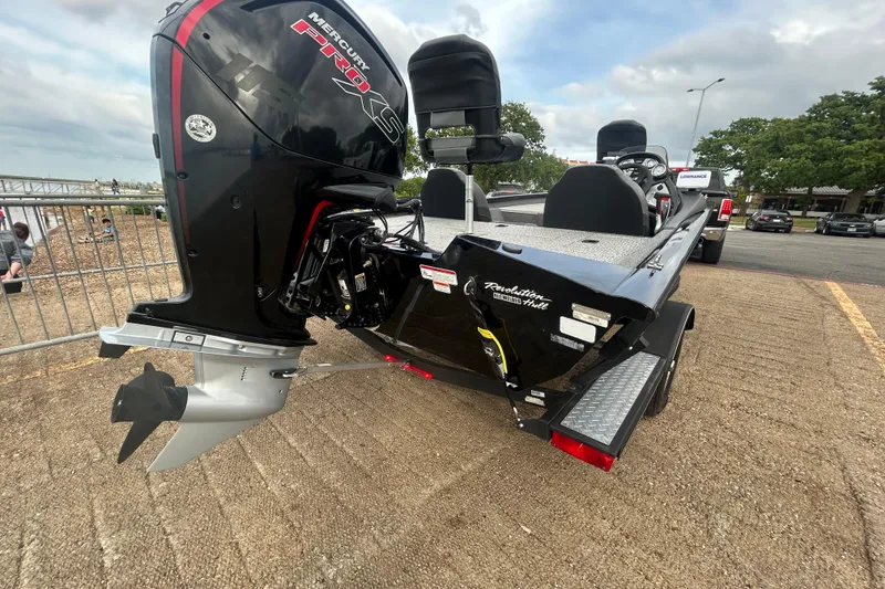 Slide: The Image of 2020 Tracker Pro Team 190 TX boat with Mercury engine, parked on a trailer. - 57