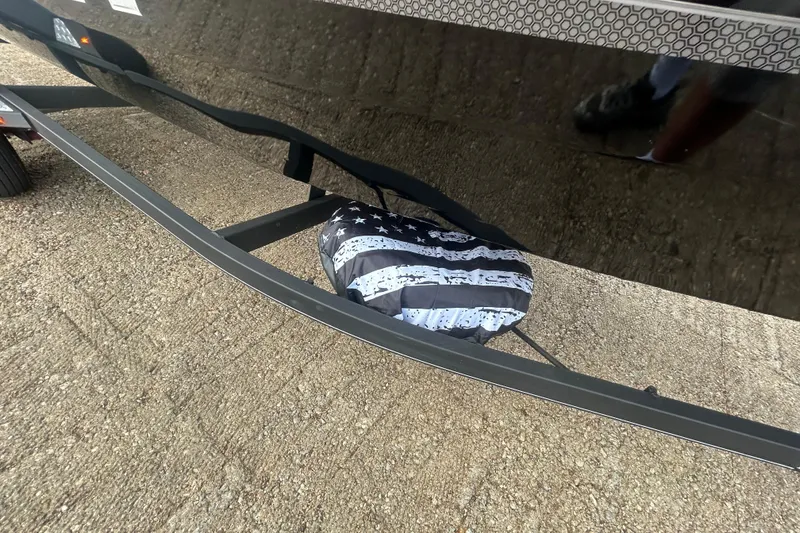 Slide: The Image of 2020 Tracker Pro Team 190 TX boat trailer with American flag tire cover. - 68