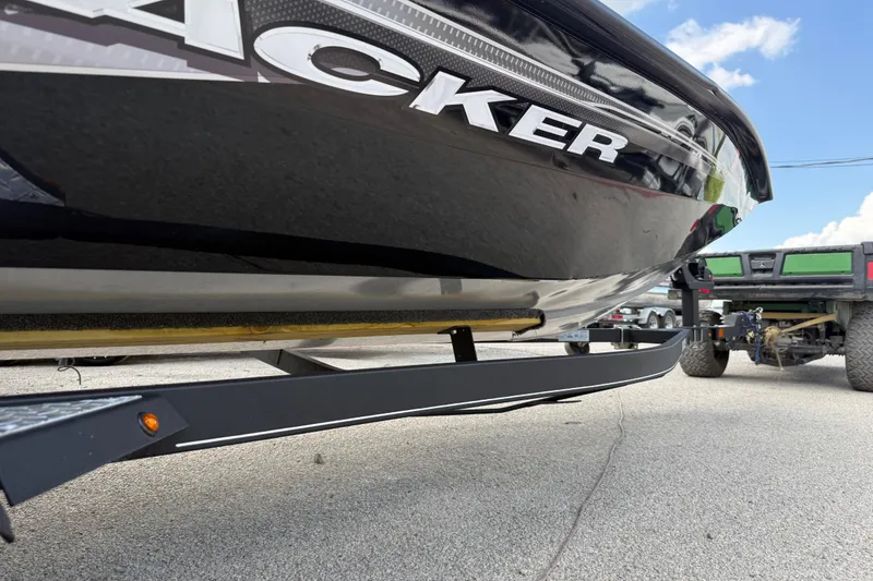 Slide: The Image of 2020 Tracker Pro Team 190 TX boat on trailer, close-up view, sunny day. - 8