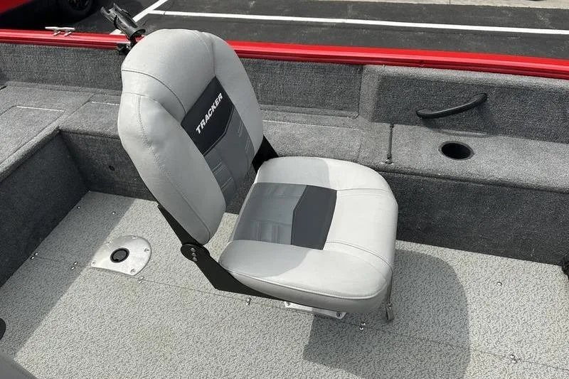 Slide: The Image of 2017 Tracker Pro Guide V-16 SC boat seat with gray upholstery and black accents. - 12