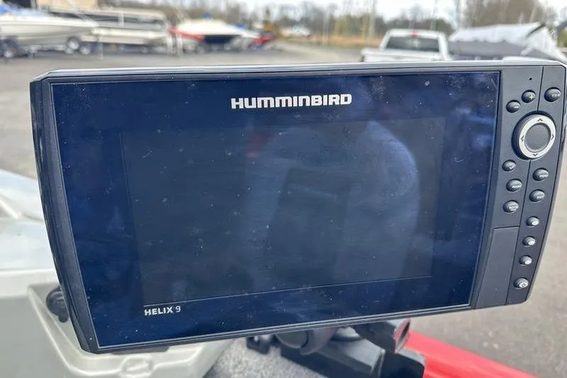 Slide: The Image of Humminbird Helix 9 fish finder on 2017 Tracker Pro Guide V-16 SC boat. - 9