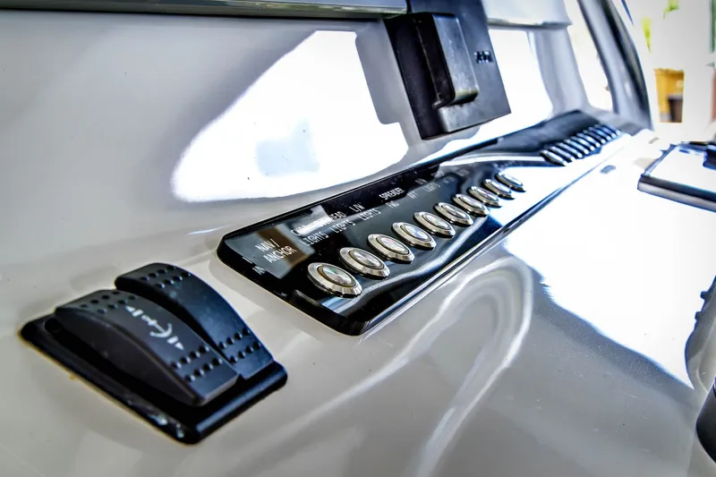 Slide: The Image of Front Runner 33 Center Console 2023, control panel with switches. - 16
