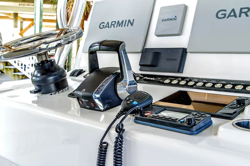 Slide: The Image of Front Runner 33 Center Console 2023 helm with Garmin electronics. - 17