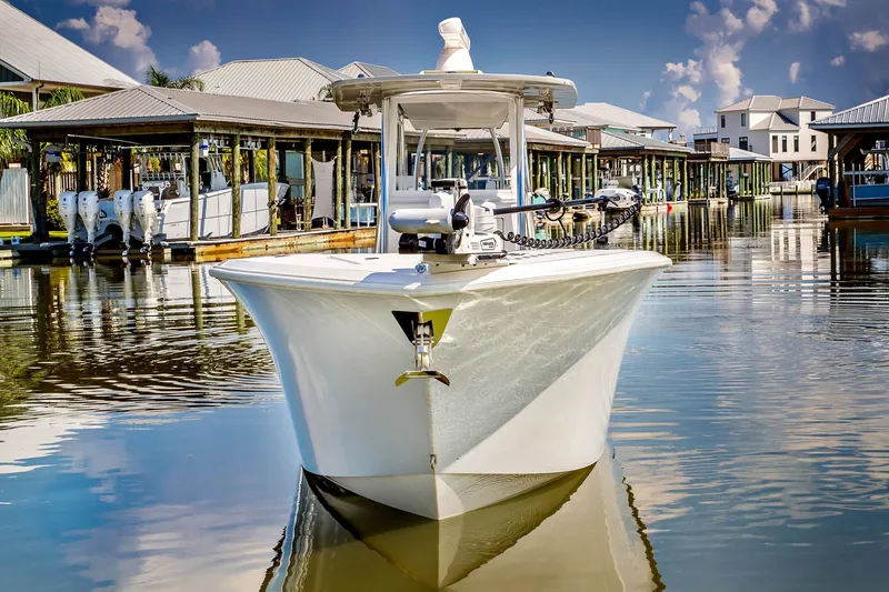 Slide: The Image of 2023 Front Runner 33 Center Console boat in harbor. - 3
