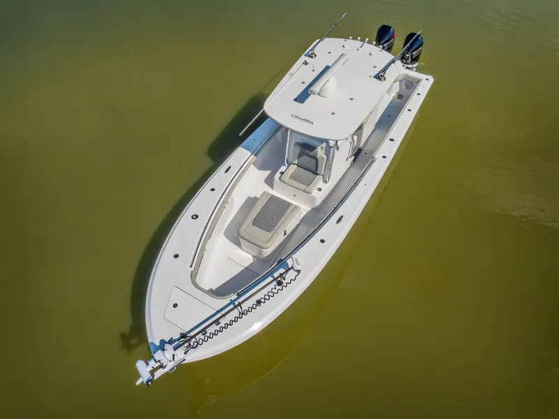 Slide: The Image of 2023 Front Runner 33 Center Console boat on calm water. - 4