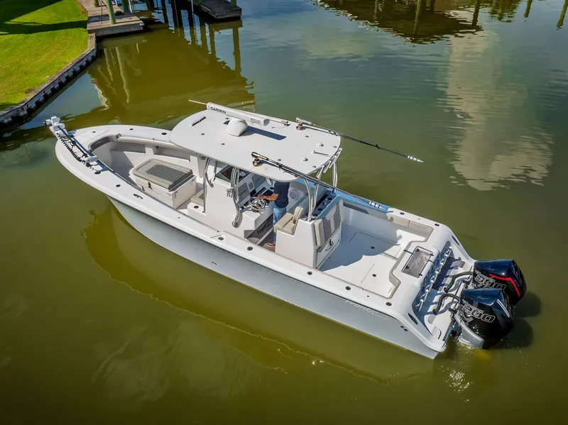 Slide: The Image of 2023 Front Runner 33 Center Console boat on calm water. - 5