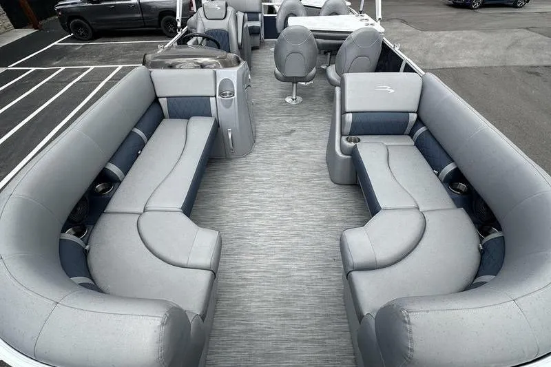 Slide: The Image of 2022 Bennington L 23 L-Bench pontoon boat interior with spacious seating and modern design. - 19