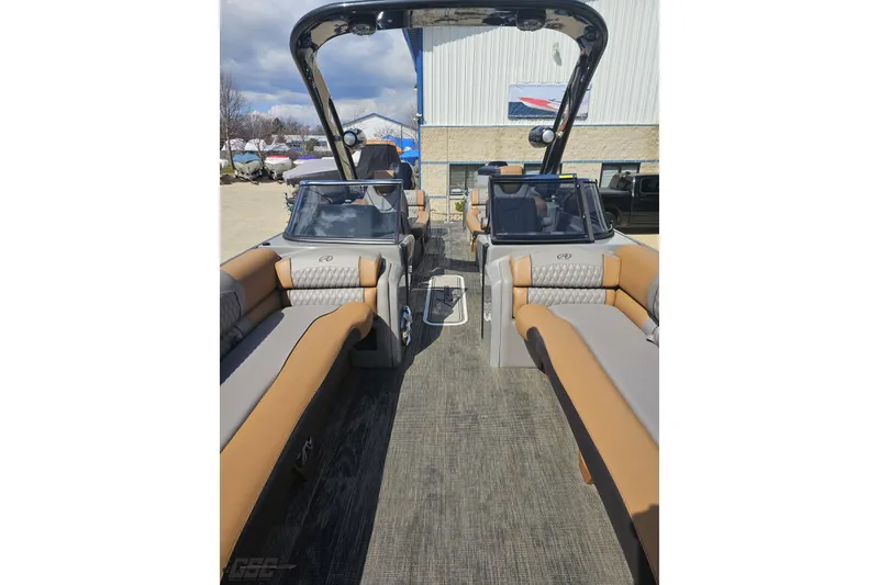 Slide: The Image of 2024 Avalon Excalibur Quad Lounge Windshield boat interior with luxurious seating. - 101