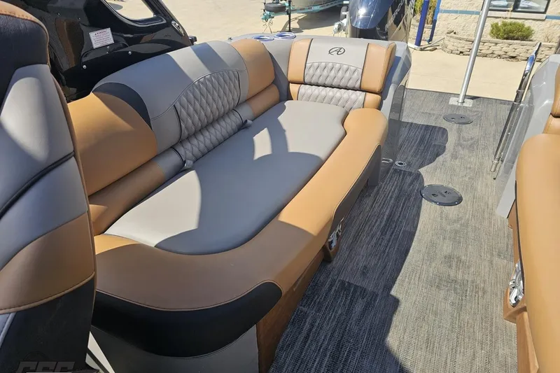 Slide: The Image of 2024 Avalon Excalibur Quad Lounge boat interior with luxurious seating and modern design. - 105