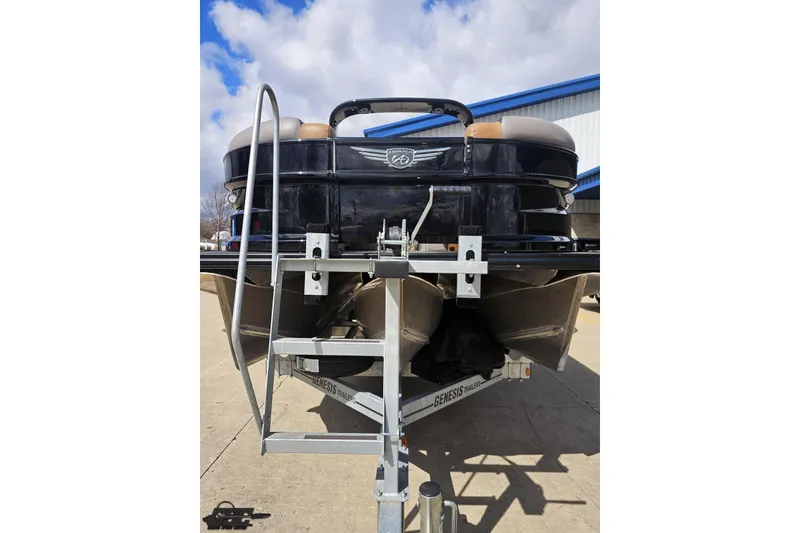 Slide: The Image of 2024 Avalon Excalibur Quad Lounge Windshield boat on trailer, rear view. - 16