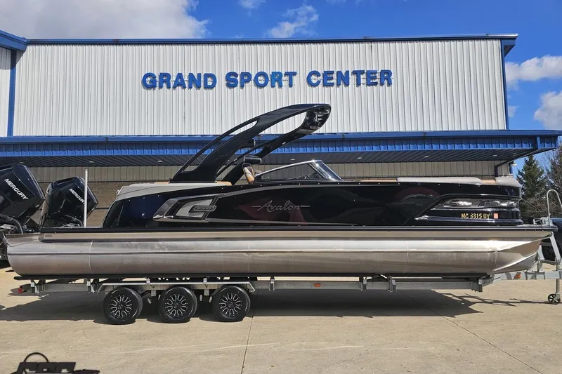 Slide: The Image of 2024 Avalon Excalibur Quad Lounge Windshield boat at Grand Sport Center. - 2