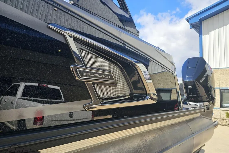 Slide: The Image of 2024 Avalon Excalibur Quad Lounge Windshield boat with sleek design and powerful engine. - 32