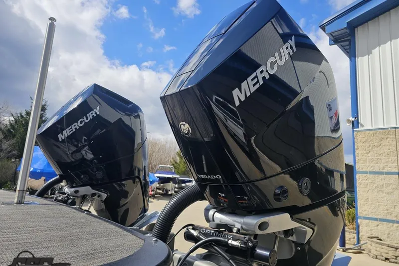 Slide: The Image of Twin Mercury outboard engines on a 2024 Avalon Excalibur Quad Lounge Windshield boat. - 37
