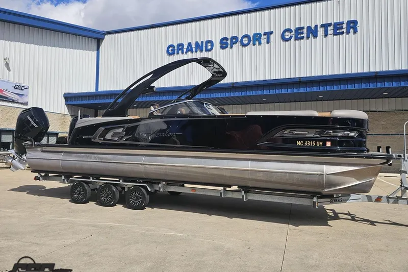Slide: The Image of 2024 Avalon Excalibur Quad Lounge Windshield boat displayed at Grand Sport Center. - 4