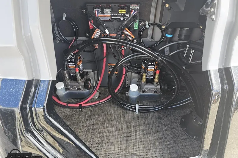 Slide: The Image of Electrical and hydraulic components inside a 2024 Avalon Excalibur Quad Lounge Windshield boat. - 47