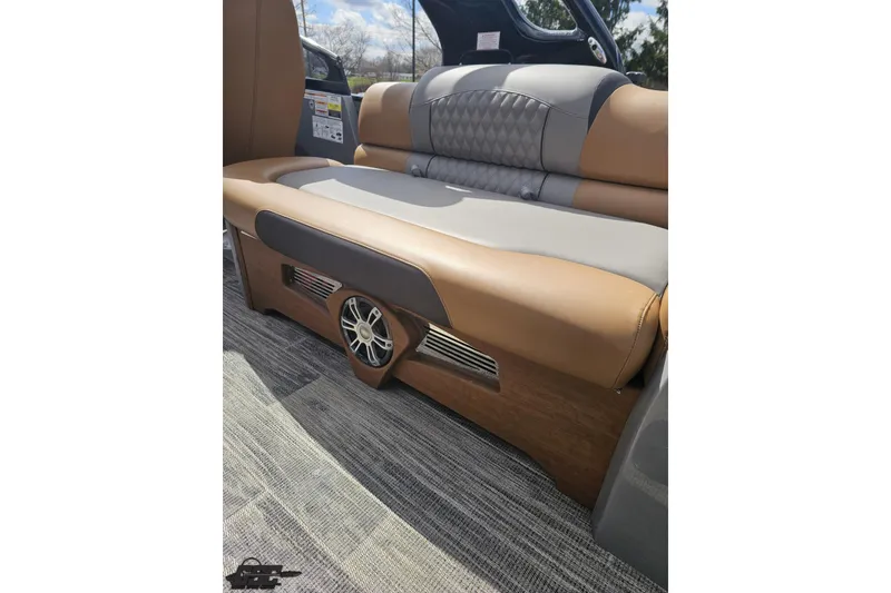 Slide: The Image of 2024 Avalon Excalibur Quad Lounge interior with luxurious seating and integrated speaker system. - 54