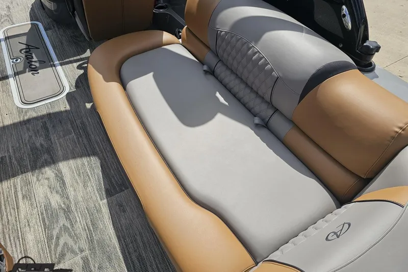 Slide: The Image of 2024 Avalon Excalibur Quad Lounge Windshield boat interior with luxurious seating. - 55