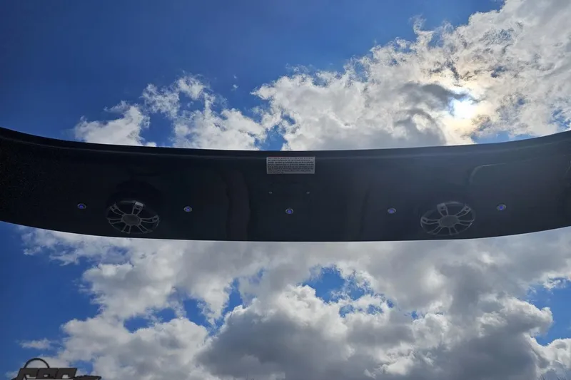 Slide: The Image of 2024 Avalon Excalibur Quad Lounge Windshield against a bright, cloudy sky. - 68