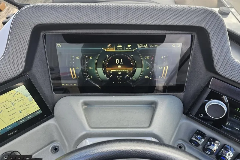 Slide: The Image of 2024 Avalon Excalibur dashboard with digital gauges and navigation display. - 82
