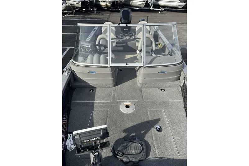 Slide: The Image of 2011 Crestliner 1850 Fish Hawk SC boat interior with Lowrance equipment. - 9