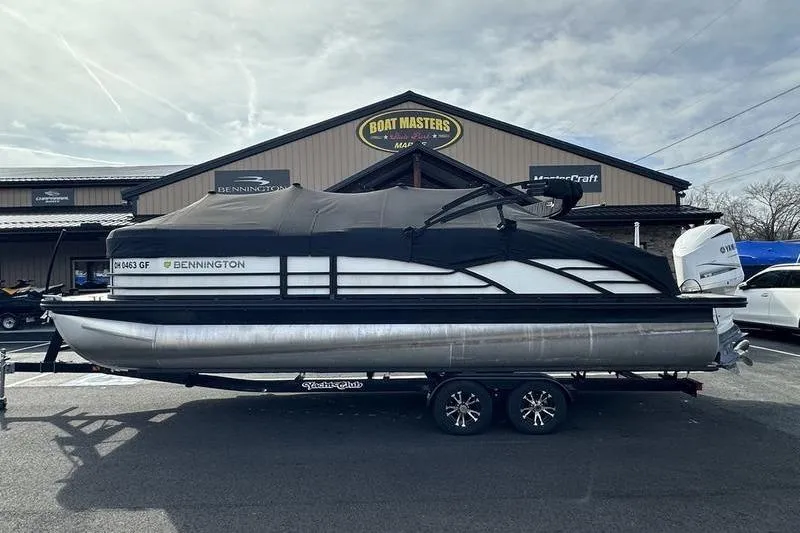 The Image of 2020 Bennington 23 R pontoon boat on trailer at Boat Masters dealership. - 1