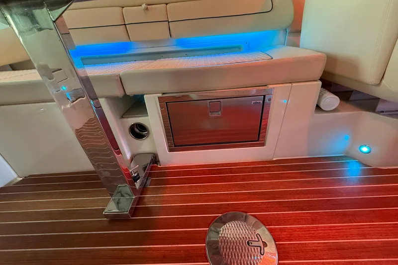 Slide: The Image of Interior of 2021 Chris-Craft Launch 31 GT with wood flooring and ambient lighting. - 17